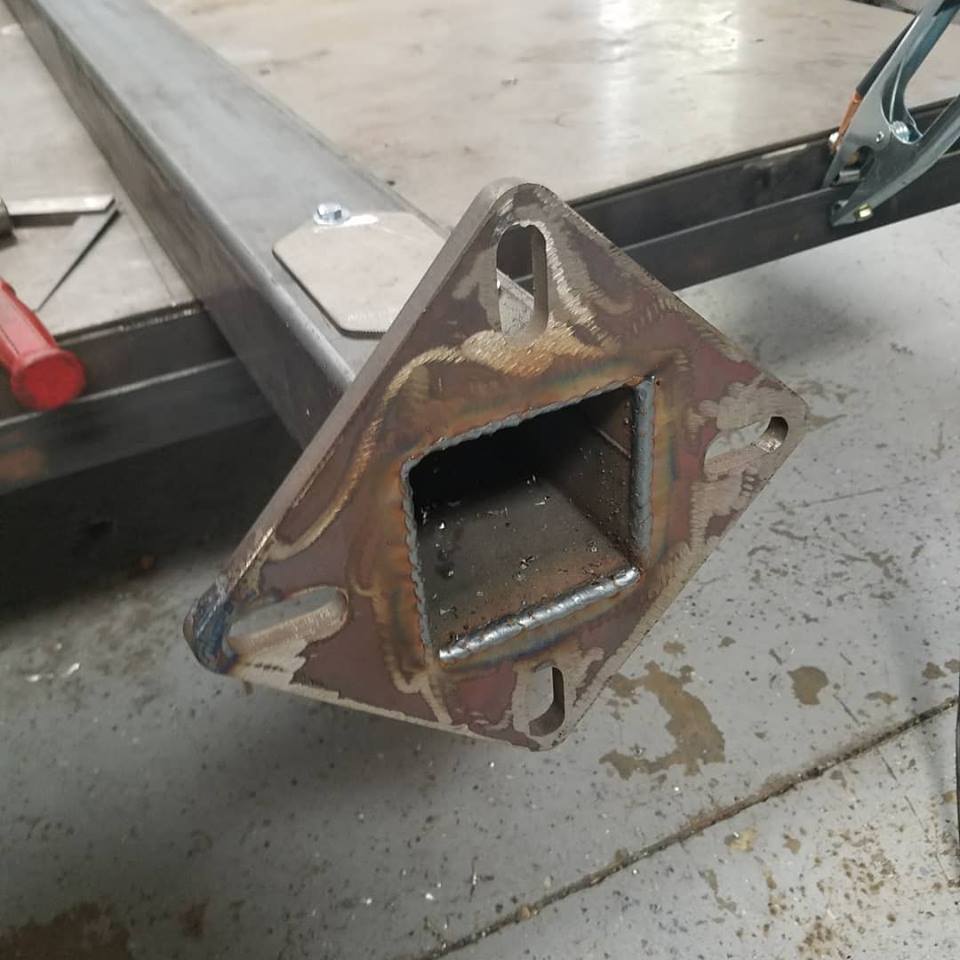 CNC plasma cut flange MIG welded to post.